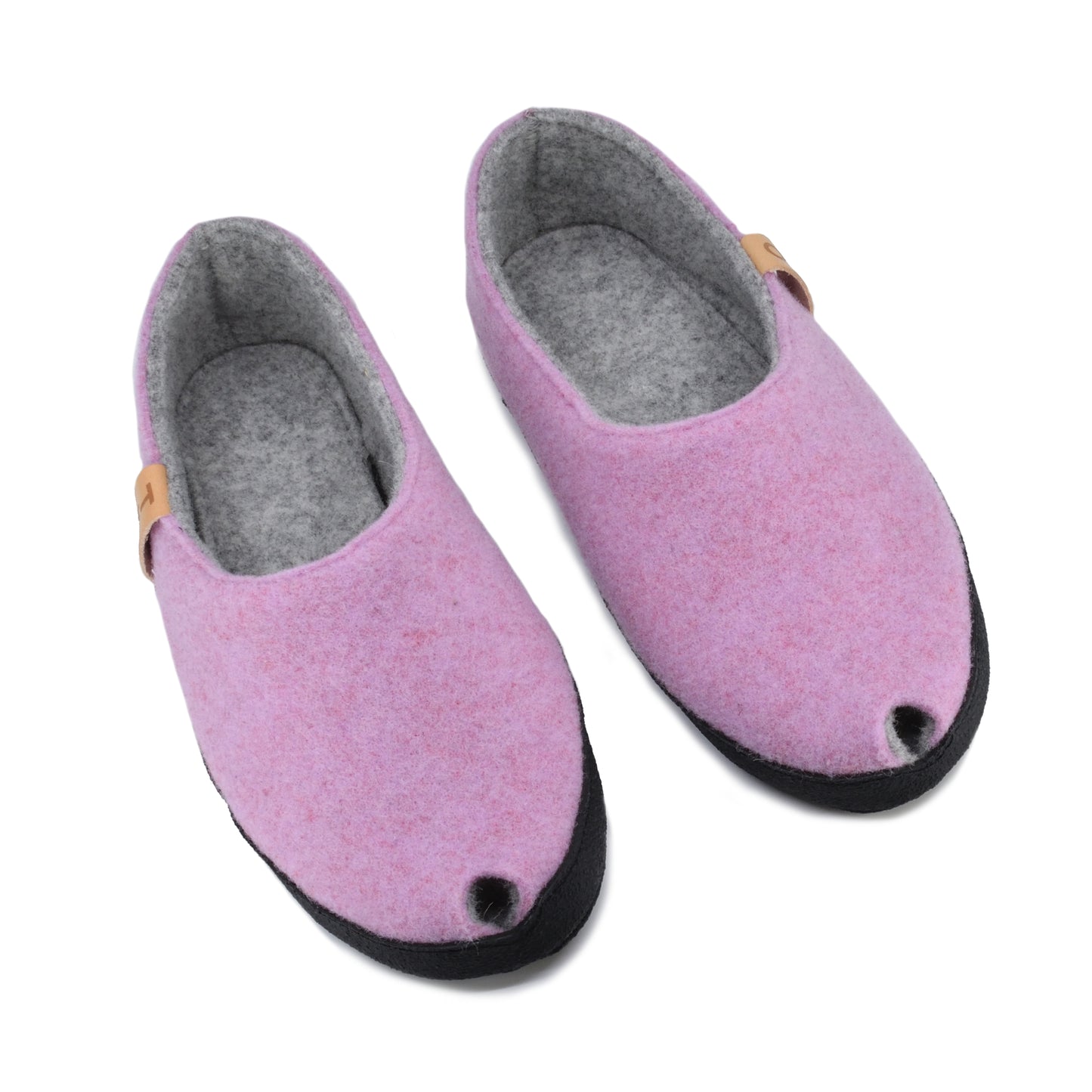 Pantuflas TOKU Budapest en rosa claro, fabricadas con lana natural de oveja.